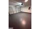 Spacious garage with garage door and ample room for parking and storage at 921 Winding Down Way, Grayson, GA 30017