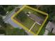 Aerial view of a home's lot with property lines, showcasing landscaping and street access at 503 Roy Huie Rd, Riverdale, GA 30274