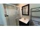 Bathroom with shower, vanity, toilet with storage, and natural light at 503 Roy Huie Rd, Riverdale, GA 30274