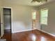 Bedroom features hardwood floors, closet, and attached bathroom at 503 Roy Huie Rd, Riverdale, GA 30274