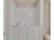 Bathroom highlighting a shower and tub combination, a toilet, and vanity at 124 Camry Sw Ln, Grayson, GA 30017
