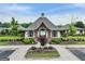 Community clubhouse featuring classic architectural design, inviting residents and guests to enjoy neighborhood amenities at 3525 Montebello Pkwy, Cumming, GA 30028