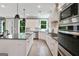 Modern kitchen features granite countertops, stainless appliances, and ample storage at 3525 Montebello Pkwy, Cumming, GA 30028