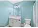 Bright bathroom featuring a vanity with white cabinets, a modern light fixture, and a toilet at 4733 Julian Way, Acworth, GA 30101