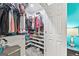 Walk-in closet with shelving, storage for clothes, shoes, and accessories at 4733 Julian Way, Acworth, GA 30101