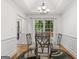 Bright dining room with classic decor and a view of the backyard at 4733 Julian Way, Acworth, GA 30101