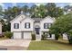 Charming two-story home with a well-manicured lawn and attached two-car garage at 4733 Julian Way, Acworth, GA 30101