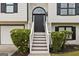 Covered front entrance with steps leading up to the front door at 4733 Julian Way, Acworth, GA 30101