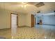 Finished basement featuring ceramic tile flooring, with multiple doors and neutral paint at 2436 Green Hollow Ct, Conyers, GA 30012