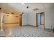 Finished basement featuring ceramic tile flooring, with multiple doors and neutral paint at 2436 Green Hollow Ct, Conyers, GA 30012