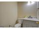 Bathroom featuring vanity, granite countertop, toilet, and neutral paint at 2436 Green Hollow Ct, Conyers, GA 30012