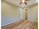 Bedroom featuring hard wood floors, neutral colored walls, and a walk-in closet at 2436 Green Hollow Ct, Conyers, GA 30012