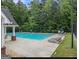 Community pool with lounge chairs and a covered area provides a relaxing atmosphere at 2436 Green Hollow Ct, Conyers, GA 30012