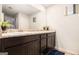 The bathroom includes a double sink vanity and granite counters at 210 Jenny Ct, Grantville, GA 30220