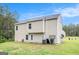 Two-story home exterior with vinyl siding and a well-maintained lawn at 210 Jenny Ct, Grantville, GA 30220