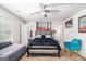 The main bedroom includes modern decor, art, and an en-suite bathroom at 210 Jenny Ct, Grantville, GA 30220