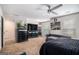 A spacious main bedroom includes a television and a walk-in closet at 210 Jenny Ct, Grantville, GA 30220