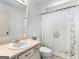 Bathroom featuring a single vanity and a shower-tub combination at 114 Overlook Dr, Mcdonough, GA 30252