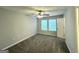Spacious bedroom featuring neutral walls, plush carpet, and a ceiling fan at 3170 W Point Cir, Douglasville, GA 30135