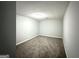 Minimalist bedroom with plush carpet and neutral walls provides a blank canvas at 3170 W Point Cir, Douglasville, GA 30135