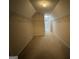 Spacious walk-in closet with shelving and carpet at 1031 Jordan Rd, Dacula, GA 30019