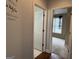 Hallway featuring access to bathroom and bedroom, with modern interior design at 1031 Jordan Rd, Dacula, GA 30019