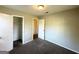 Comfortable bedroom features plush carpeting, neutral paint tones, and a closet at 4039 Codel Nw St, Atlanta, GA 30331