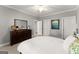 Bedroom with an elegant dresser and a queen bed, creating a welcoming space at 1104 Victoria Ne St, Atlanta, GA 30319