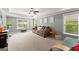 Large bonus room with windows, couch and decor for a flexible space ideal for Gathering fun at 1104 Victoria Ne St, Atlanta, GA 30319