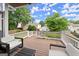 Outdoor deck with seating and picturesque views of the landscaped backyard and lush greenery at 1104 Victoria Ne St, Atlanta, GA 30319