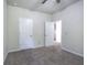 Neutral bedroom featuring carpeted floors, a doorway, and natural light at 158 Bryon Ln, Acworth, GA 30102
