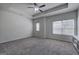 Large bedroom featuring tray ceilings, neutral colors, and plentiful natural light at 158 Bryon Ln, Acworth, GA 30102