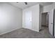 Cozy bedroom with neutral carpet and a closet visible through open door at 158 Bryon Ln, Acworth, GA 30102