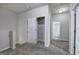 Upstairs hallway with closet space and doorway to bathroom at 158 Bryon Ln, Acworth, GA 30102