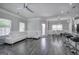 Open concept living room with view to the kitchen and dining area at 158 Bryon Ln, Acworth, GA 30102