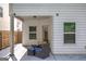 A covered outdoor patio featuring stylish furniture and access to natural light at 158 Bryon Ln, Acworth, GA 30102