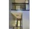 Bright foyer featuring a view of the staircase and a doorway leading to another room at 692 Sedgwick Dr, Jonesboro, GA 30238