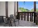 Cozy balcony with seating, offering views of the surrounding trees and blue sky at 1017 Camelot Dr, Atlanta, GA 30349
