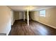 Finished basement features a staircase, several rooms, and wood flooring at 3670 Broadview Ct, Decatur, GA 30032