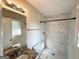 Updated bathroom with a granite countertop vanity and new tiled shower at 3670 Broadview Ct, Decatur, GA 30032