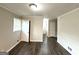 Bedroom with wood floors, neutral paint, and ample closet space at 3670 Broadview Ct, Decatur, GA 30032