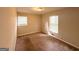 Neutral bedroom features two windows that provide lots of natural light at 3670 Broadview Ct, Decatur, GA 30032