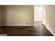 Spacious living room with wood flooring and neutral wall colors at 3670 Broadview Ct, Decatur, GA 30032