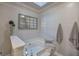 Bathroom featuring a neutral tile surround, tub, and towels at 123 Mill, Dallas, GA 30157