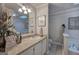 Bathroom with a countertop sink with a wall mirror and sky light at 123 Mill, Dallas, GA 30157