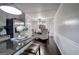 Open floorplan with kitchen island leading to the dining area with seating at 123 Mill, Dallas, GA 30157