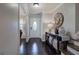 Warm entryway with a decorative console table and stylish accents creating an inviting space at 123 Mill, Dallas, GA 30157