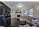 Comfortable living room features a stone fireplace and plush sectional sofa for relaxation at 123 Mill, Dallas, GA 30157