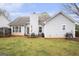 Spacious backyard with a patio and dining area at 1765 Neighborhood Walk, Mcdonough, GA 30252