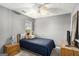 Bedroom with ceiling fan, carpet floors, and natural light at 1765 Neighborhood Walk, Mcdonough, GA 30252